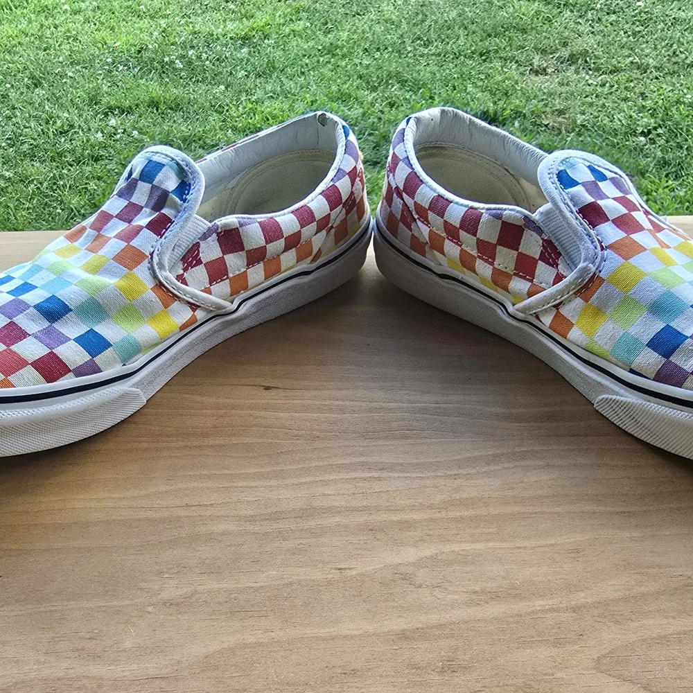 Vibrant Kid’s Vans Rainbow Checkerboard Slip-Ons – Playful + Iconic